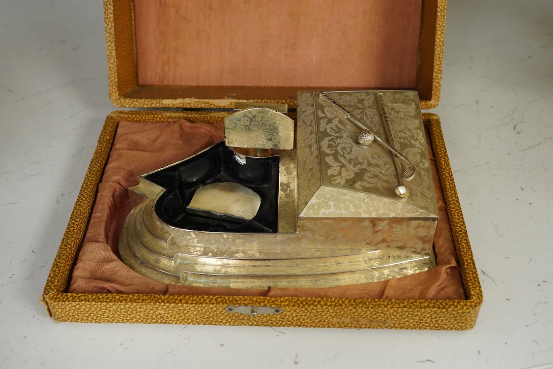 Golfing interest, a cased mid 20th century smokers stand, 17cm wide